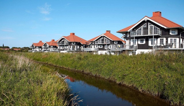 6 person holiday home on a holiday park in Bogense