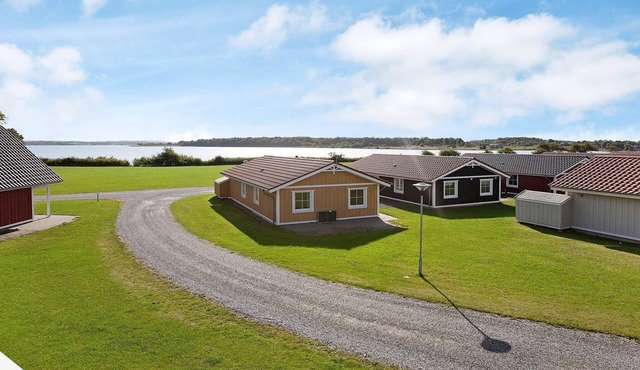 6 person holiday home on a holiday park in Gråsten
