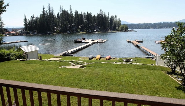 60 Feet Of Sandy Waterfront With Large Lawn, Spacious Deck And Beautiful Views.