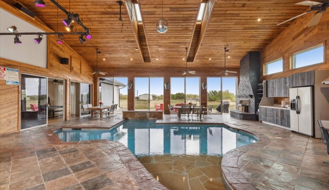 6000 SQFT Estate w/TX Shaped Indoor Pool + Game Room & Separate Guest House