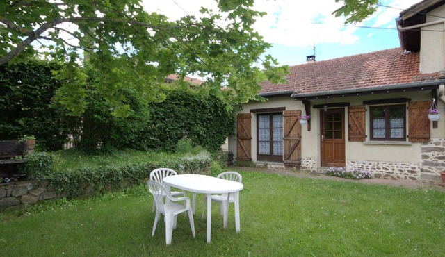 65 sqm cottage with fireplace, terrace, and children's play area