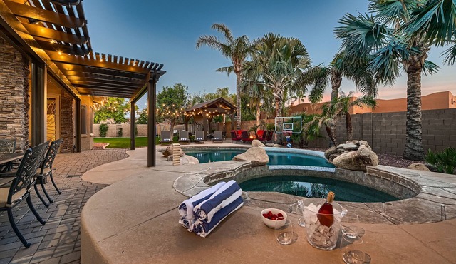 6BR/4.5BA oasis w/heated pool/spa, 3 ensuites, oversized lot, games, fire pits