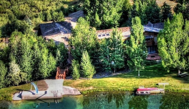 7,000 SQ FT CABIN ON 150 ACRES PRIVACY WITH ITS OWN PRIVATE LAKE.