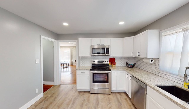 7 bed 3 bath fully renovated home that boasts 2 living rooms, a MUST see!