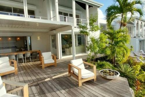 7 bedrooms Villa, Nestled in the heights of Anse Marcel, one of the most discreet bays of the island.