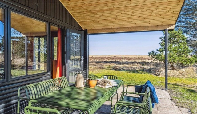 70s holiday home with sea view near Hals