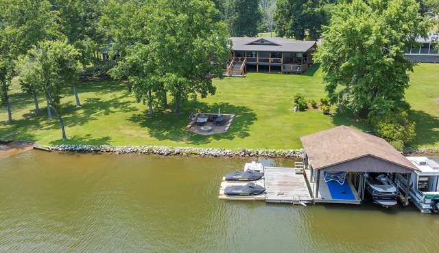 7BR/5BA SML Lakefront – Walk to Private Dock w/Boat Lifts, Fire Pit & Views!