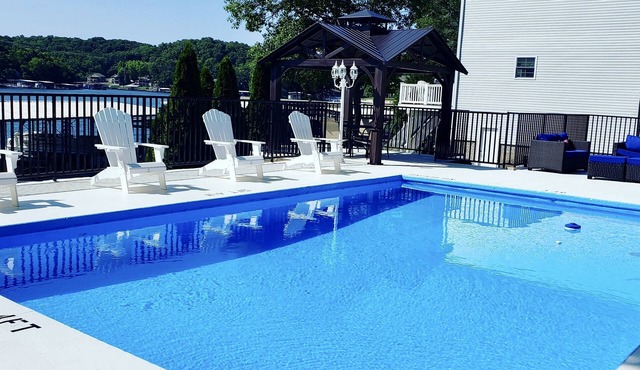 7BR Lakefront Home with Private Heated Saltwater Pool and 2 Dock Slips