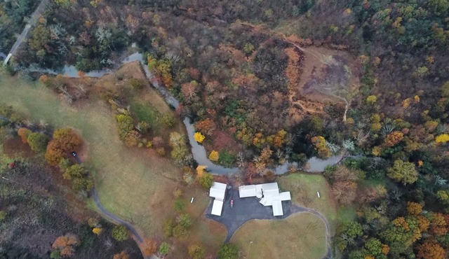 8. Beautiful secluded creek front lodge sleeps 19