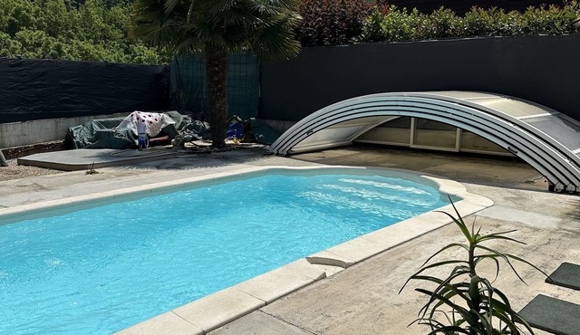 8-bed house with private pool, secured by electric gate.