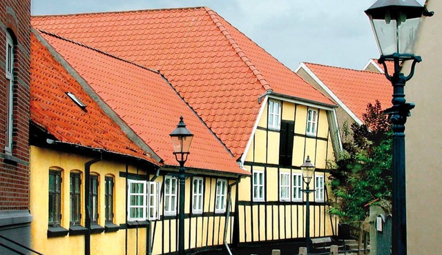8 person holiday home on a holiday park in Bogense