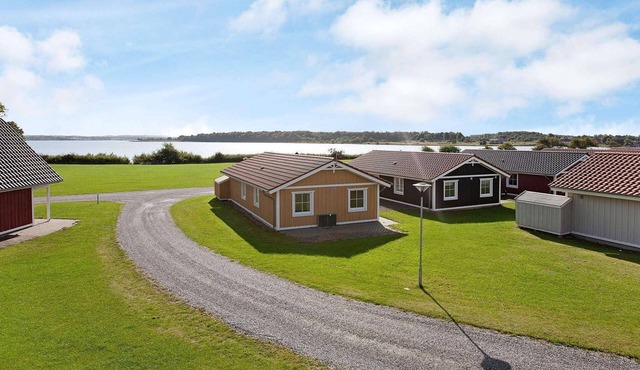 8 person holiday home on a holiday park in Gråsten