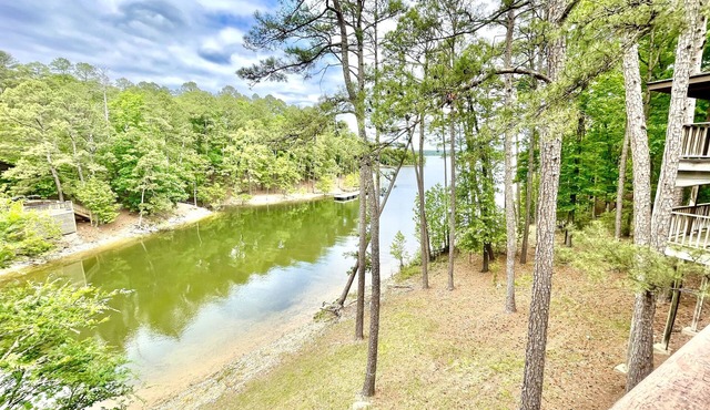 80BPD, Four bedroom, two 1/2 bath log-sided condo with lake view , garage by RedAwning