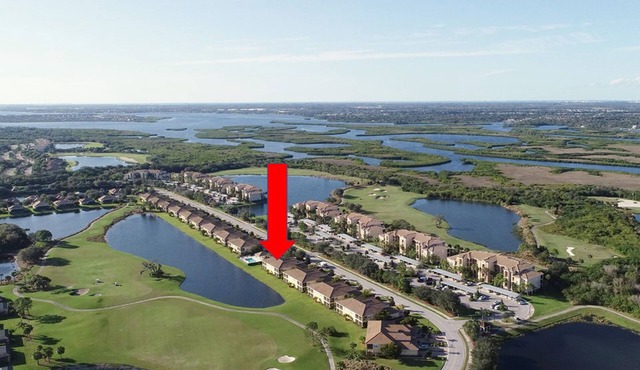 8304-102 Gorgeous golf and lake view coach home next to pool