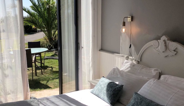 A 2 bedroom gite sleeping 4 plus a cot with access to a heated covered pool.