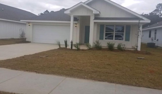 A 4-bedroom, 2 bath home with pond view.