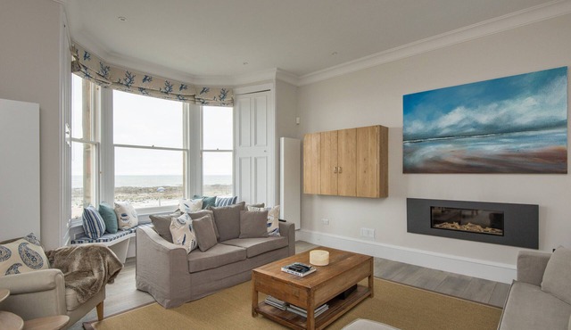 A 4-bedroom luxury holiday home with enchanting sea views across Milsey Bay Beach