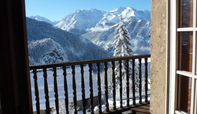 A balcony overlooking the Alps