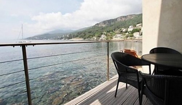 A balcony overlooking the sea