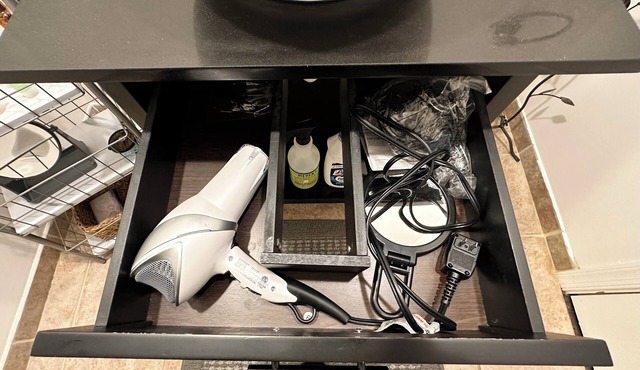 A basement apartment with private bedroom, full bath, kitchen and entrance.