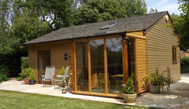 A beautiful pine chalet with its own private garden surrounded by fields