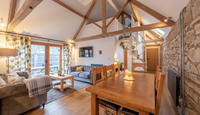 A Beautiful converted barn, sleeps 6 with own hot tub and enclosed garden