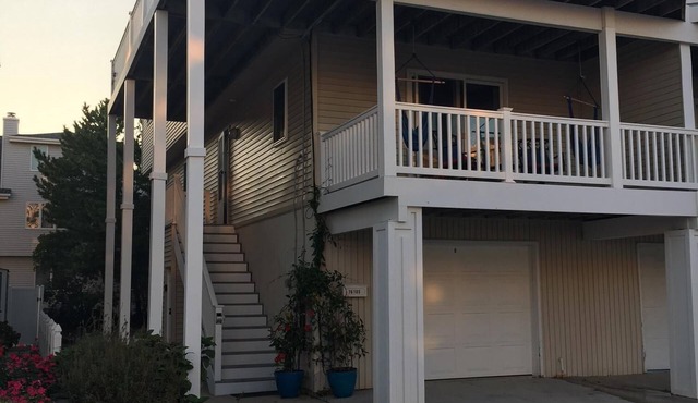 A Beautiful Large 4 Bedroom Home just 50 feet from the beach access.