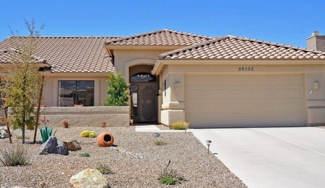 A beautifully appointed, one level southwest style home Saddlebrooke Arizonan