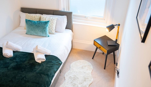 A beautifully designed home only a stones throw away from the beach front!