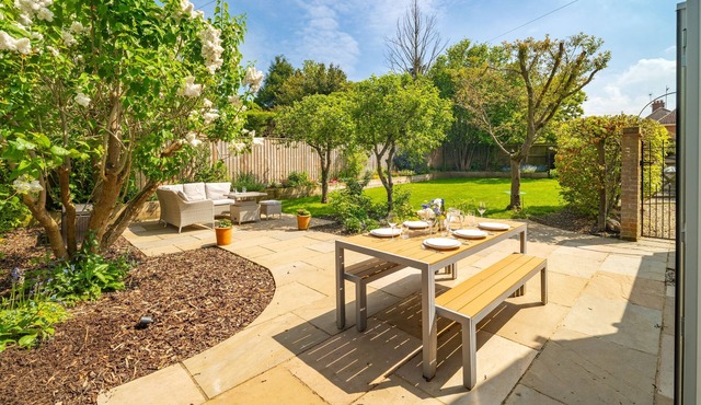 A beautifully furnished, traditional 1890's detached brick and flint cottage.