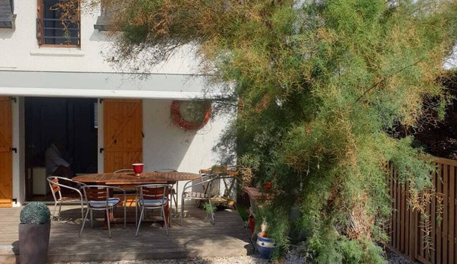 A blue house on the wild coast