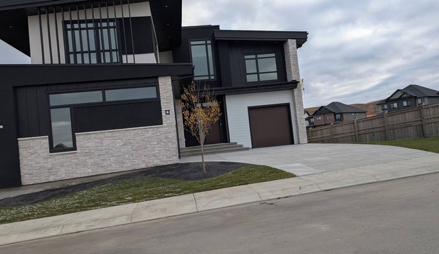 A brand new 2 bedroom walkout legal basement suite in Upper Greenwich NW Calgary