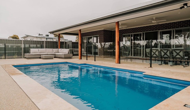 A Brand New Home with a Pool overlooking The Black Bull Golf Course