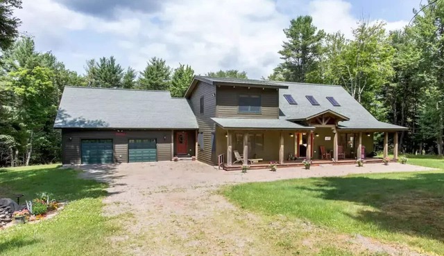 A breathtakingly pristine luxury cabin on 14 private acres