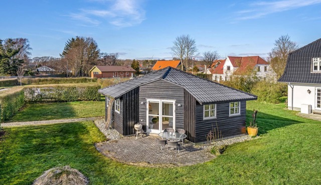 A bright cute vacation home in the north of Jutland and close to the beach.
