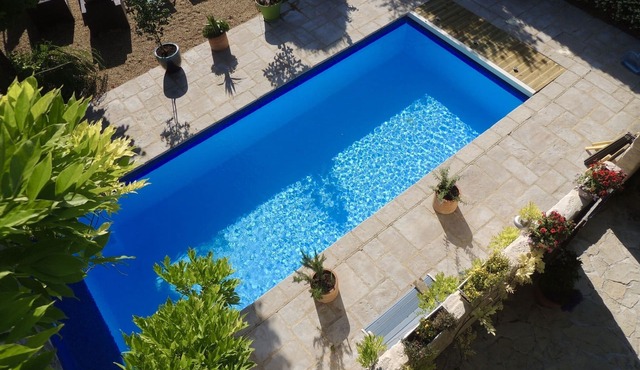 A character stone house with private heated swimming pool.