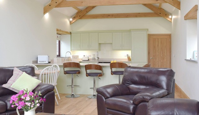 A characterful barn, delightfully converted to offer open-plan living.