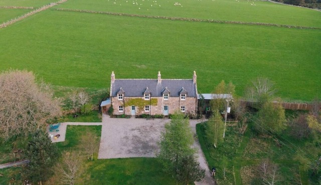 A characterful detached cottage-style home with private wood fired hot tub and sauna, offering comfortable accommodation for up to six guests.