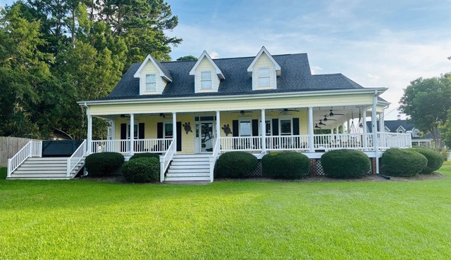 A charming 3-bed/3.5 bath home with in-ground pool and jacuzzi on Pages Creek