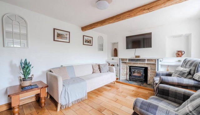 A charming and beautifully presented three-bedroom old miners cottage