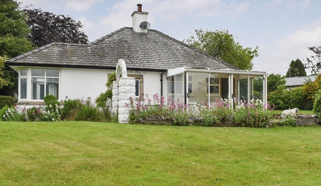 A charming and homely detached cottage all set out on one level.