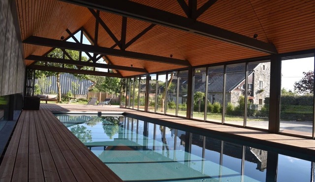 a charming apartment inside an old farm, with swimming pool