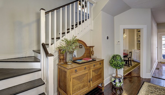 A charming cottage nestled in the historic Fostoria Neighborhood.