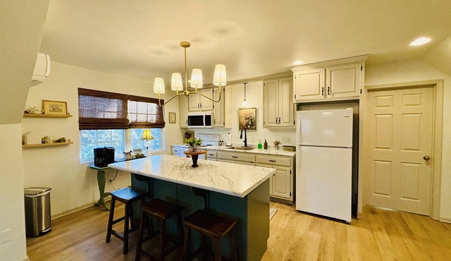 A charming cottage, recently renovated in a serene wooded area of Hanceville, AL