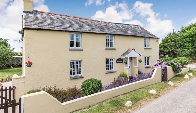 A charming, detached farmhouse with plenty of character.