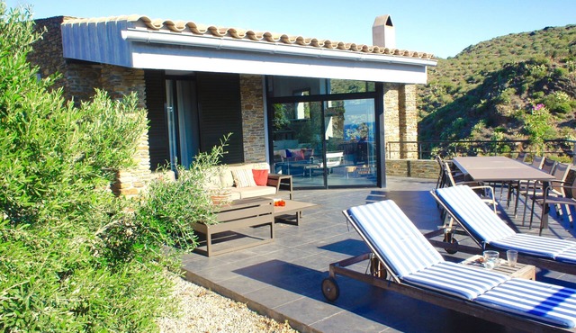 A charming family home with private pool in Cadaques with sea views.