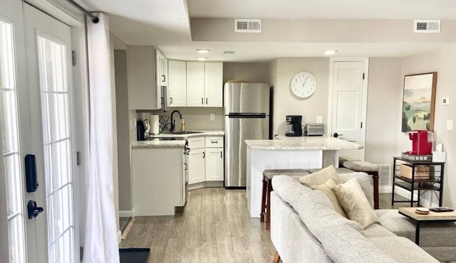 A clean luxury suite on a lakeside view with city amenities within 5 minutes.