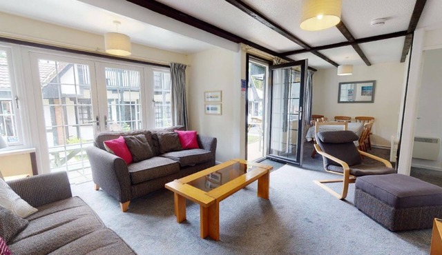 A comfortable accommodation for up to nine guests set within the grounds of Tolroy Manor