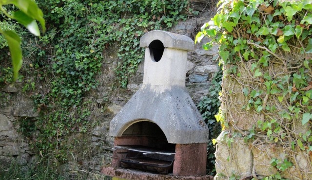 A converted stone Barn, sleeps 7 with a large garden and swimming pool