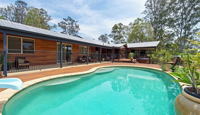 A cosy farmstay with dwarf goats, spa, pool, fire pit and other gourmet options.